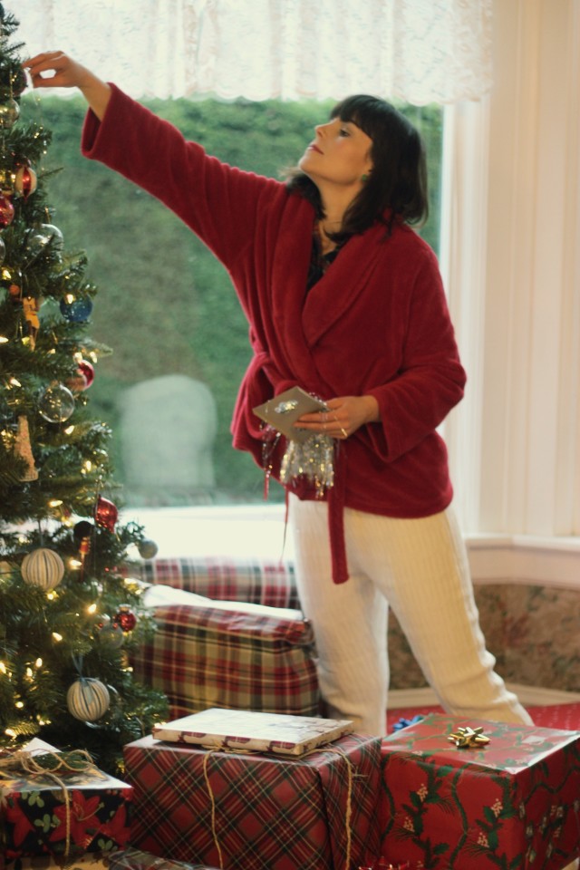 What to wear on Christmas Day, Hue quilted Shue Slippers, Hue Cable Sweater Relaxed leggings, Lord and Taylor Robe, Old Navy Plaid Shirt, Christmas Tree, Leopard skin rug, Holiday Fashion, Hallmark Gift Wrap, Christmas Tree Tinsel 