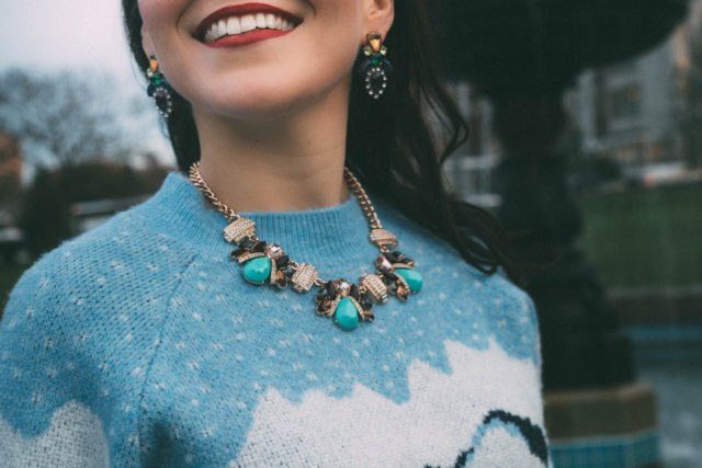 Victoria Emerson, Bronze Purple and Turquoise Statement Necklace, Silicone Powder Blue Floral Statement Necklace by: Victoria Emerson, Multicolor Geometric Statement Earrings, Statement Jewellery, H&M Pleated Tulle Skirt, Christmas Sweater, Holiday outfit ideas, Christmas fashion