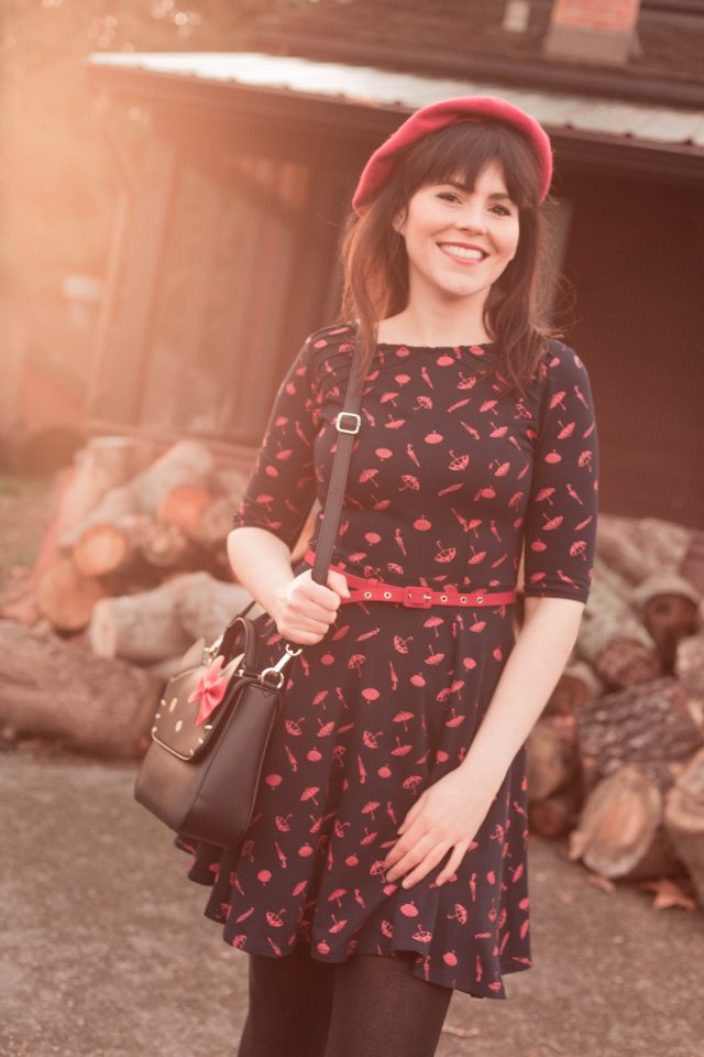 Unique Vintage Navy & Red Umbrella Knit Fit & Flare Dress, Unique Vintage, ModCloth for Hello Kitty Pop Culture Cutie Crossbody Bag, Modcloth, Intelligent Around Town Belted Coat in Dots, B.A.I.T. Footwear Paris, Prance Heel in Rouge,